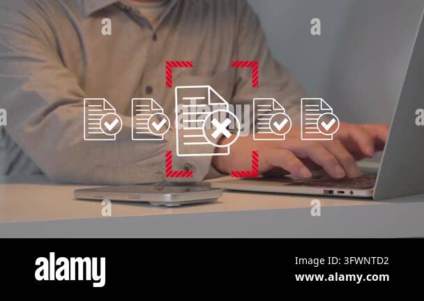 Person works on documents. Red warning icon blocks progress. Files ...