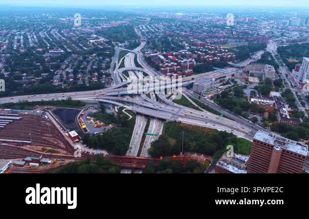 Intricate and heavily trafficked complex highway junction in the green ...
