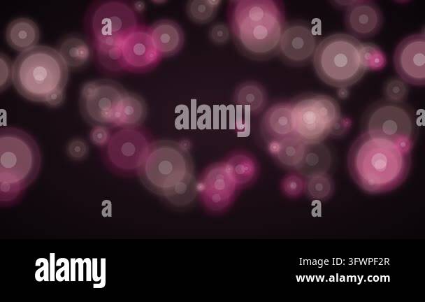 Abstract animation of soft pink and purple bokeh light particles ...