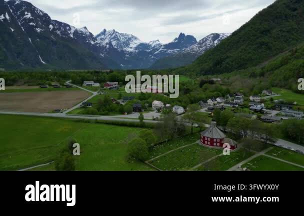 Snow In Athens Aerial view of a small village nestled in a valley with snow capped ...