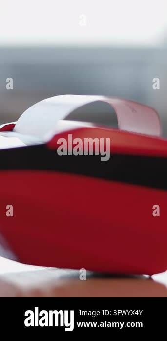 Red Tape Dispenser On Wood Desk, Shallow Focus On Curved Plastic Body ...