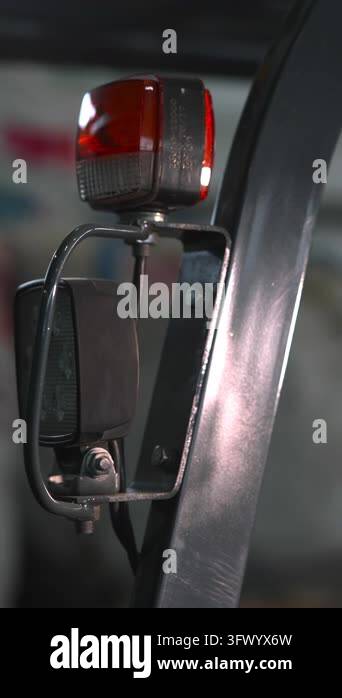 Forklift Amber Warning Light Closeup, Metal Frame And Mirror In Dim ...