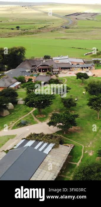 High angle view of a countryside farm property with scattered buildings ...