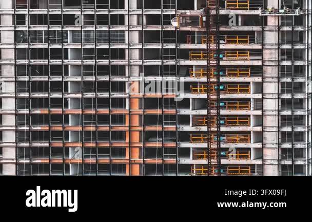 Partial view of a high-rise building under construction with exposed ...