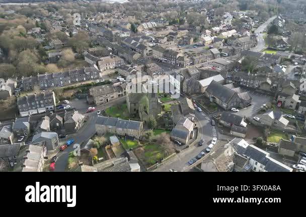 Aerial view of a small town with houses and a church in a rural setting ...