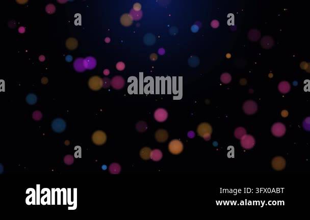 Color Defocused Bokeh flow featuring multi-colored glowing circles ...