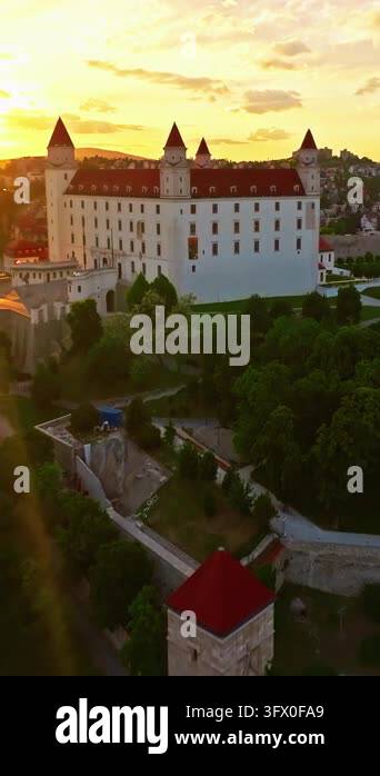 Aerial view of Bratislava Castle at sunset, a historic landmark in the ...
