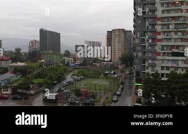 Residential towers rise above Batumi streets in a wide city view ...