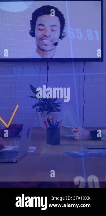 Vertical video: Remote host presenting on monitor business charts ...