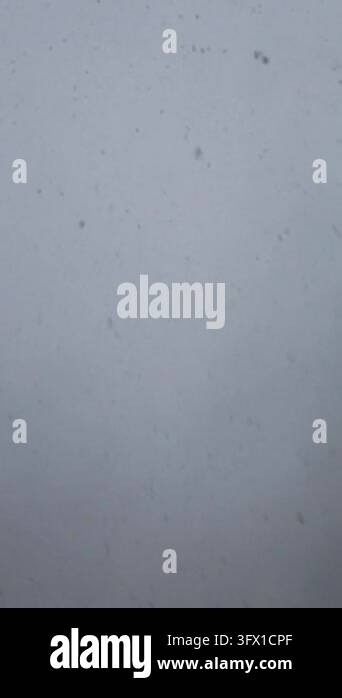 Cpf Background Falling snowflakes; abstract atmospheric shot to represent snowfall ...