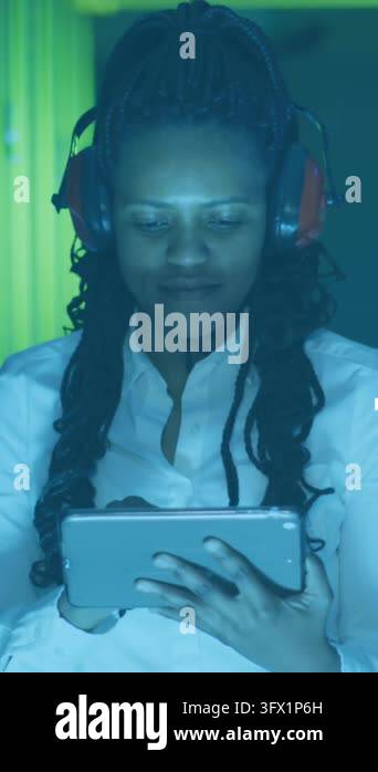 Animation of data processing over african american it woman by computer ...