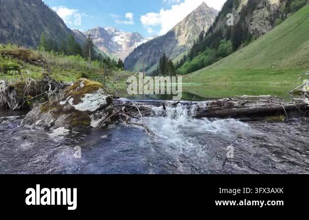 Flow Rate Def Scenic nature river flow. Picturesque waterfall creek. Nature wildness ...