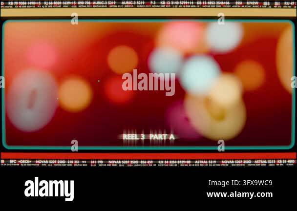 Starting playback, teal frame REEL 3 PART A showing bokeh, ticker, dust ...