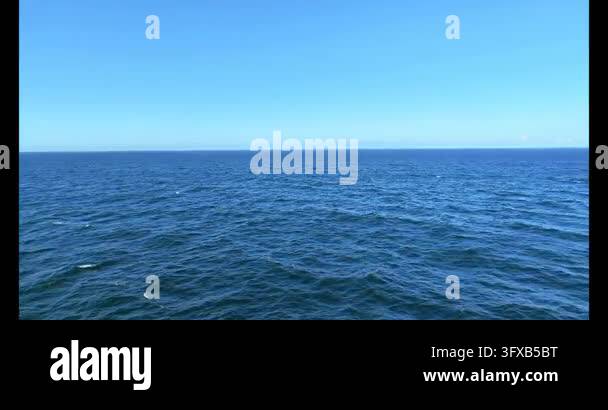 Blue Ocean Under Clear Sunny Sky 4K Stock Video Footage - Alamy