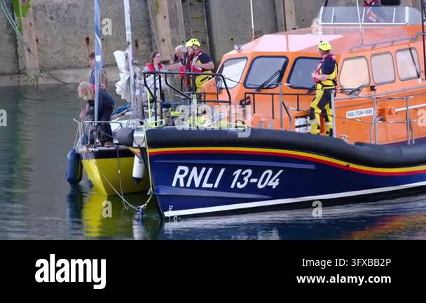 Seahouses, Northumberland, UK, 06.25.2026. RNLI in action.. A fishing ...