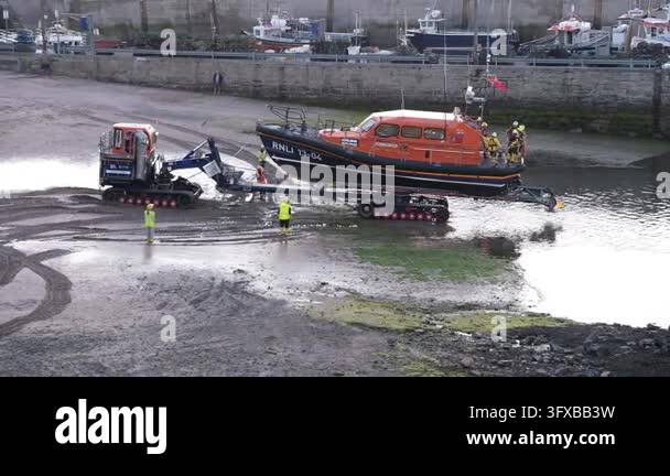 Seahouses, Northumberland, UK, 06.25.2026. RNLI in action.. A fishing ...