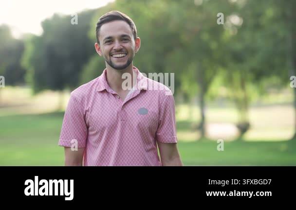 He Smiling Vector Smiling young man with a beard standing on a beautiful golf course. He ...