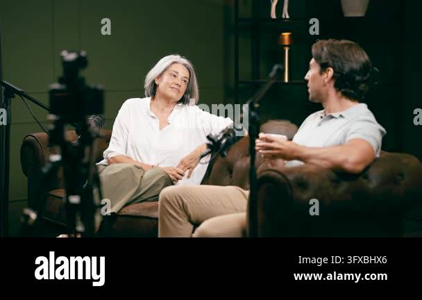 Interview Podcast Vector Charismatic senior woman with gray hair passionately speaking during a ...