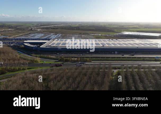Three Large Warehouse Vector Aerial view of a large blue warehouse with solar panels Stock Video ...
