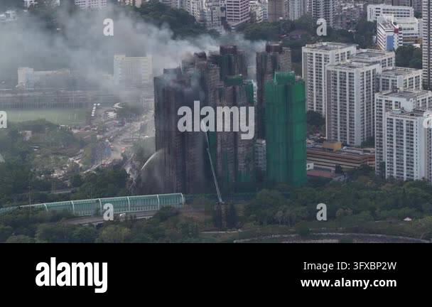 Aerial view of a major fire at a high-rise residential building Stock ...