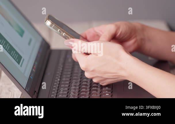 Close-up of female hands holding a smartphone and scrolling social ...