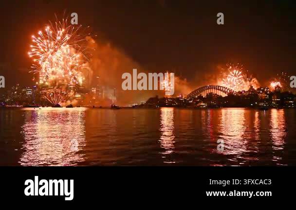 4K footage of fireworks exploding simultaneously above Sydney Opera ...