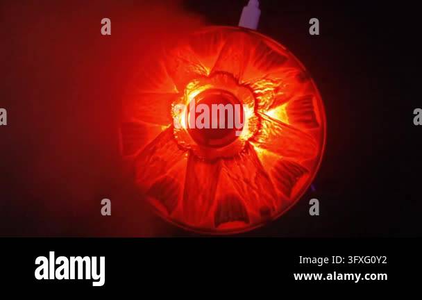 Valcano Red Overhead view of volcano diffuser glowing red with USB cable and rising ...