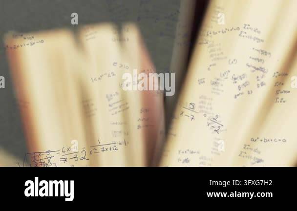 Camera pulling back, two open books fanning pages, revealing math ...