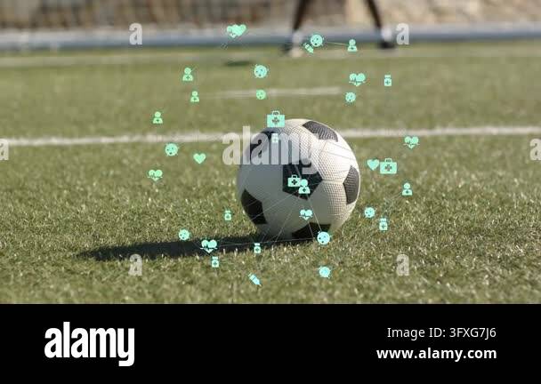 Male striker stepping, kicking soccer ball to net, cyan icons floating ...