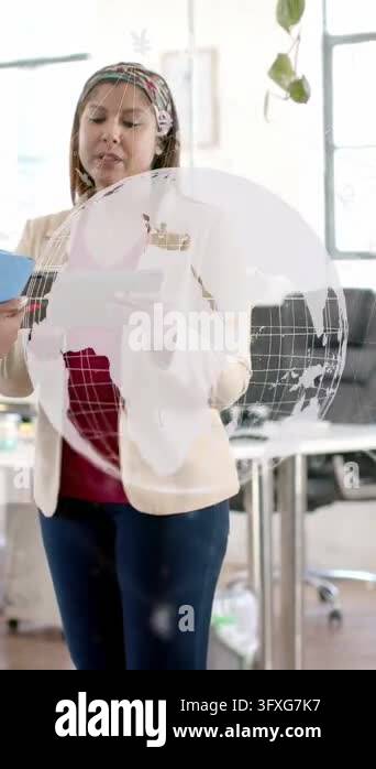 Vertical video: Woman tapping tablet after bringing it closer ...