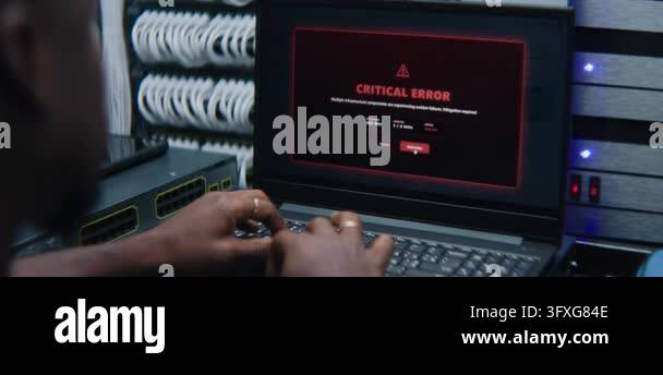 System Administrator Analyzing Live Server Metrics at Workstation in ...
