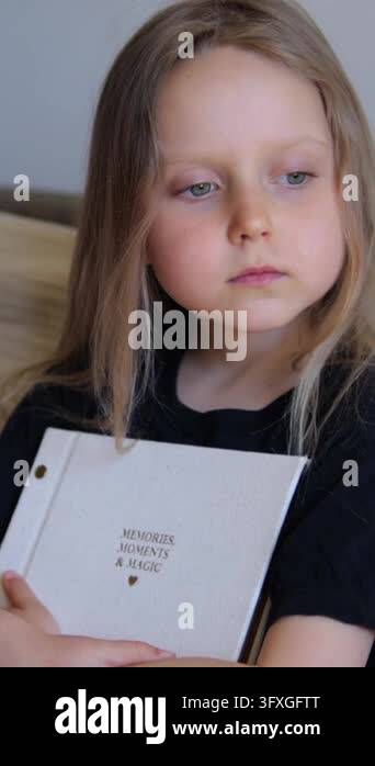 Blue Magic Lp Thoughtful little girl with long blonde hair and blue eyes tenderly ...