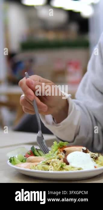 Rice Simple Vector Close up of a woman eating a fresh salad bowl with vegetables and rice ...