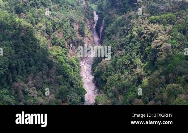 Rocky Stream Vector High angle drone reveal of narrow waterfall canyon and rocky river ...