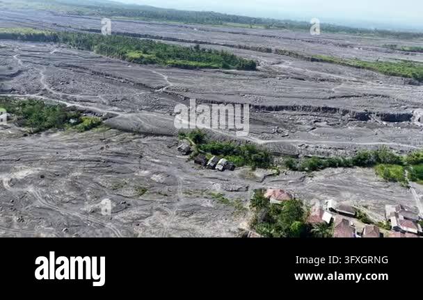 High angle drone shot overlooking a network of dry, solidified volcanic ...