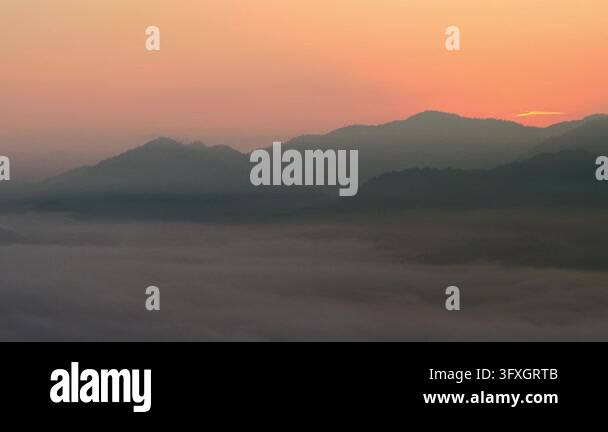 Gradient Soft Pink Hd A serene mist covered mountain landscape at sunrise with layered hills ...