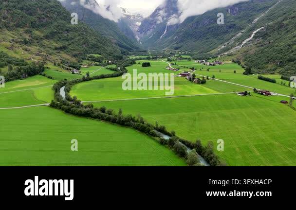 aerial view of beautiful landscape with green fields and mountains ...
