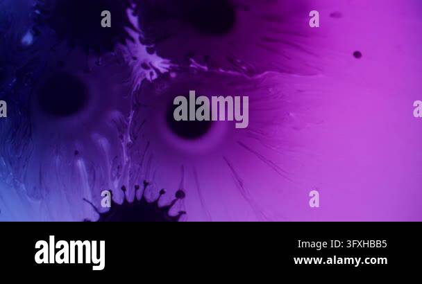 Ink leaking. Chemical paint. Defocused purple blue neon color bubbles ...