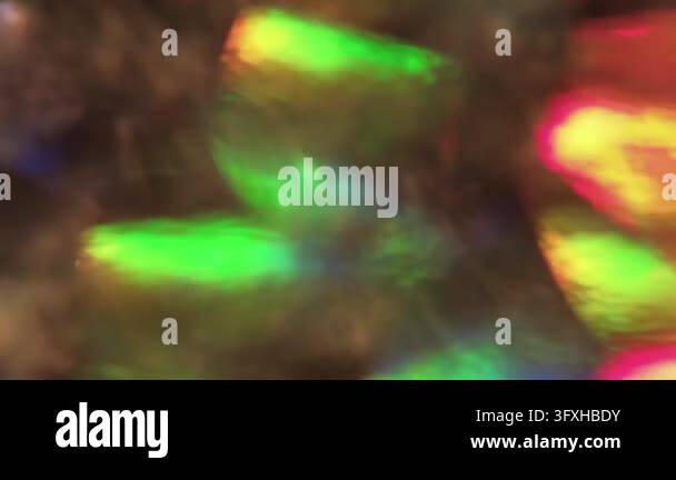 Defocused twinkle flash. Glare art. Pink green blue colorful ...