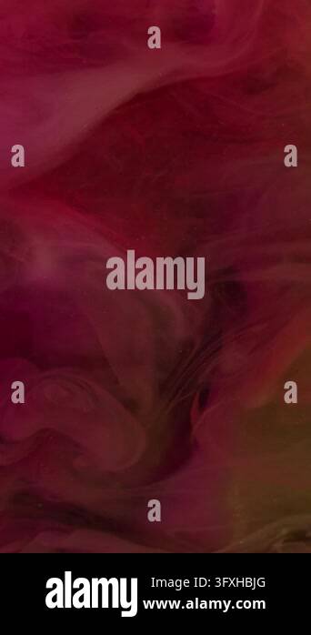 Vertical video. Vapor mix. Paint drop. Defocused yellow purple pink ...
