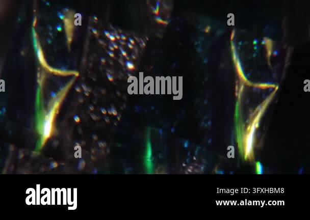 Defocused dazzle glow. Illuminated ray. Yellow green blue color optical ...