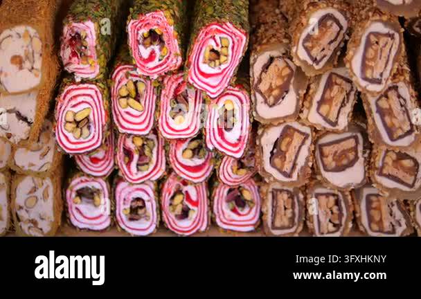 Snac Chocolate Assorted confectionery fills display with colorful nougat and chocolate ...
