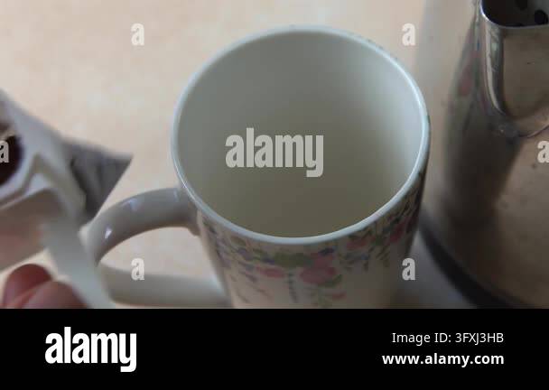 Pouring Hot Water into Drip Coffee Bag in Ceramic Cup Close Up Stock ...