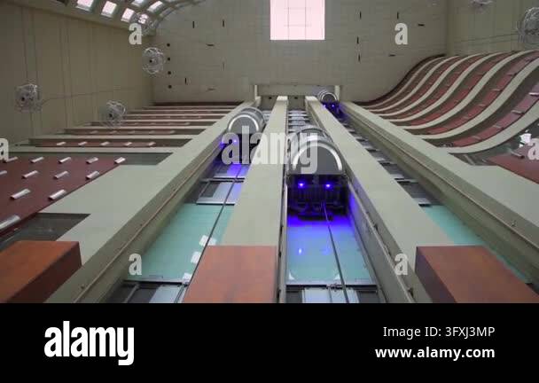Low Angle View of Elevators and Geometric Building Facade Stock Video ...