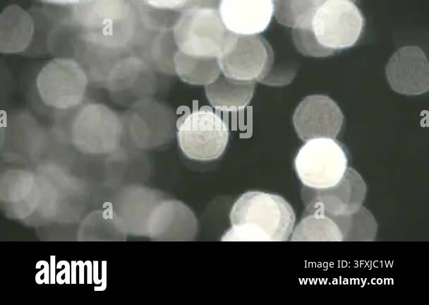 Water Ripple Background 4k Defocused sun glare on a rippling water surface creates a beautiful ...