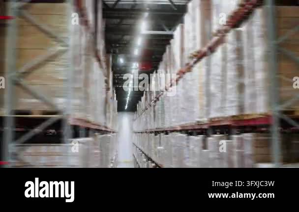 Three Large Warehouse Vector Large distribution center with tall warehouse racks and pallets of ...