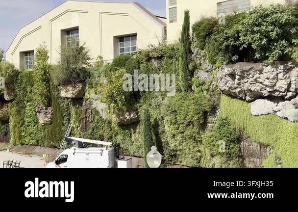 Barcelona, Spain, August 13, 2026 - A living green wall at CaixaForum ...