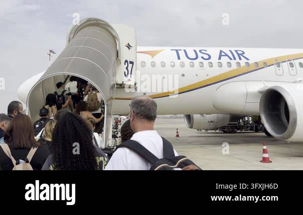 Tel Aviv, Israel, October 11, 2026 - Passengers boarding a TUS Airways ...
