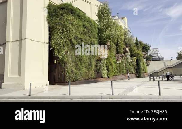 Barcelona, Spain, August 13, 2026. A lush living wall at CaixaForum ...