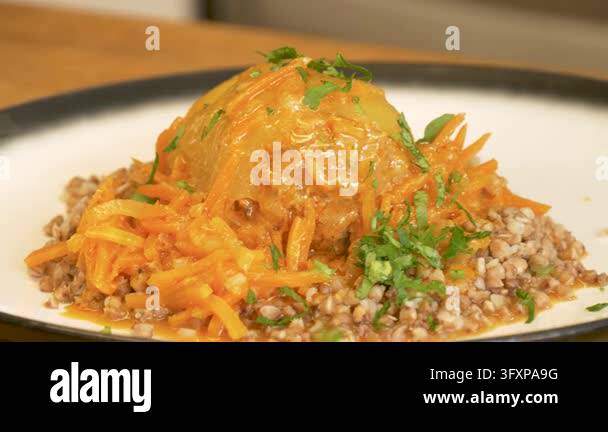 Traditional style stuffed bell pepper with savory meat filling served ...